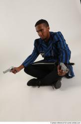Garson SITTING POSE WITH GUNS